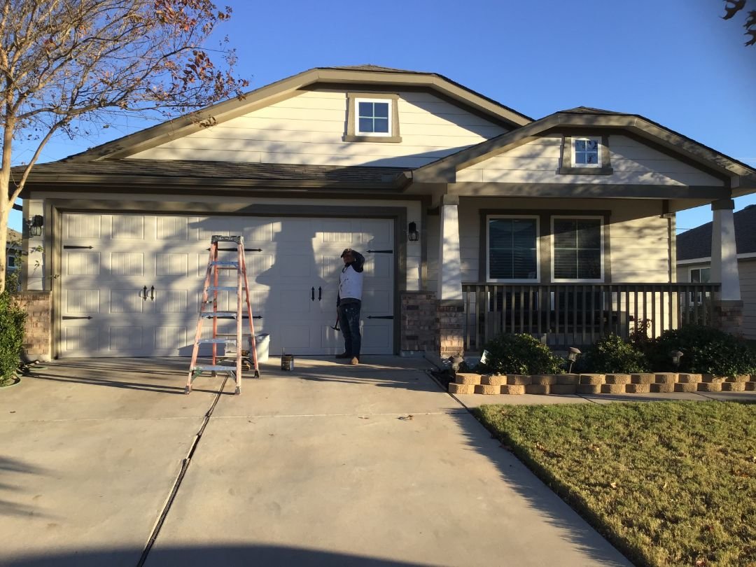 Exterior-Painting-in-Progress-–-Garage-Door-Focus
